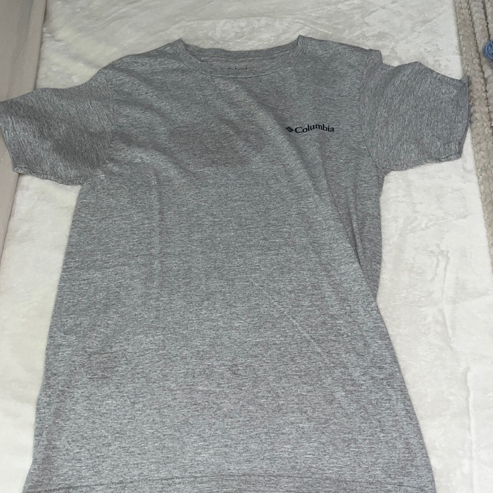 Columbia size small t-shirt with some stains in it